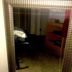 New mirror with rubbed metal like border